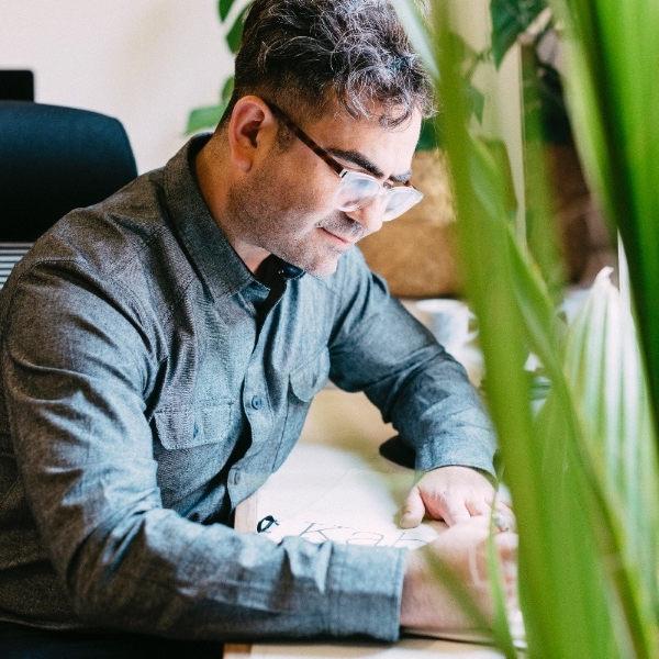 Portrait of Luciano Vergara working.